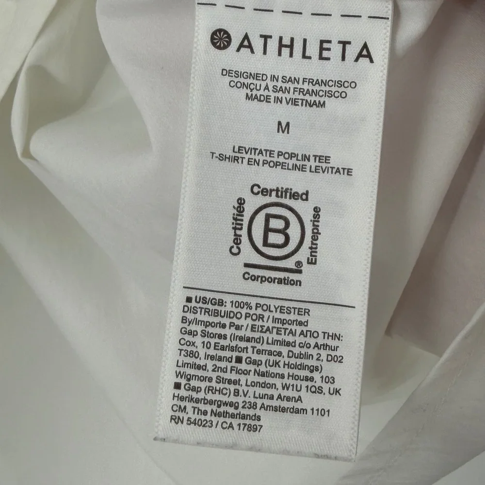 Athleta Levitate Poplin Tee Womens Medium White V-Neck Smocked Puff Sleeve Top
